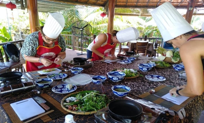 Cours de cuisine dans le village de légumes biologiques de Tra Que à Hội An 5